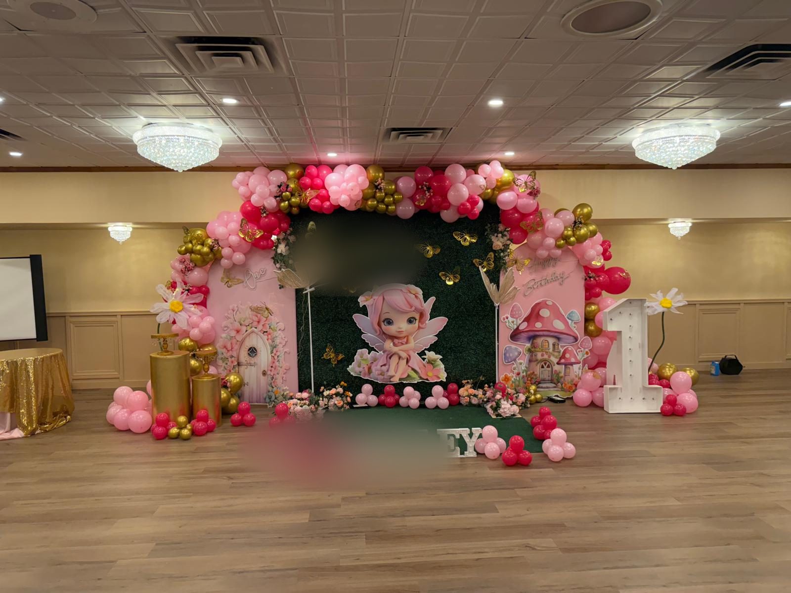 A first-birthday setup in the banquet hall