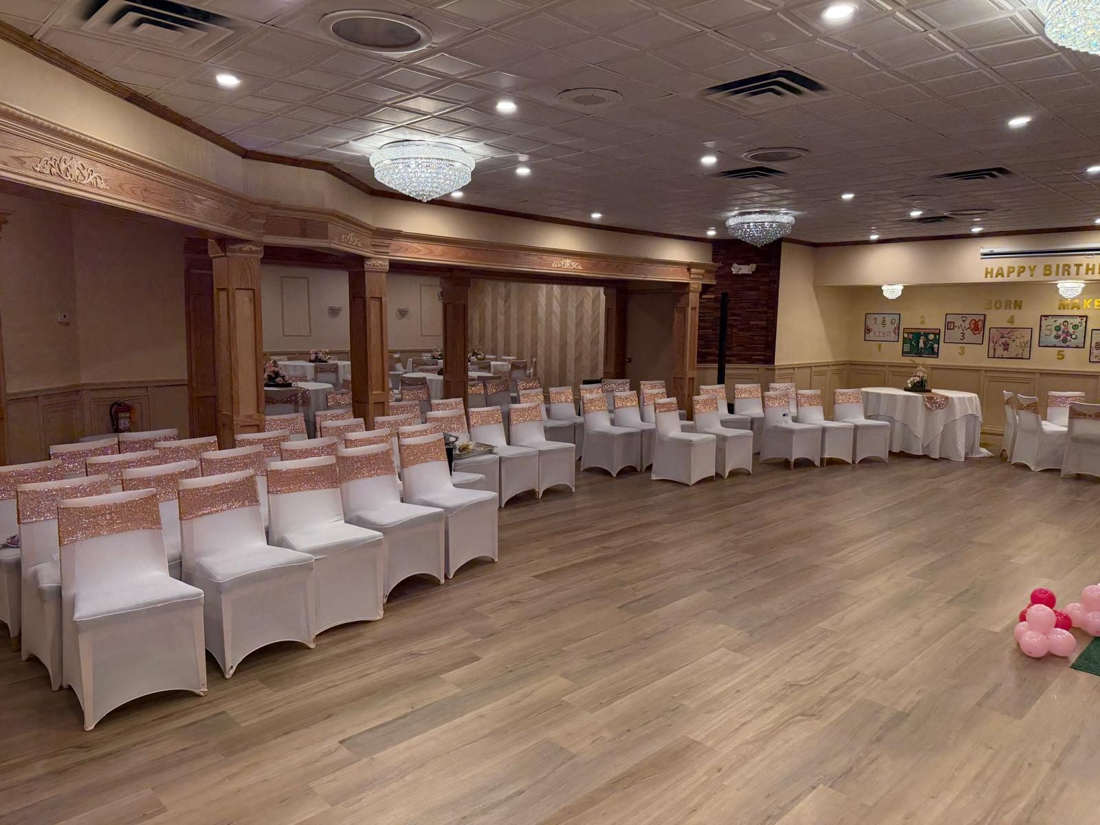 The hall seated in rows for a celebration