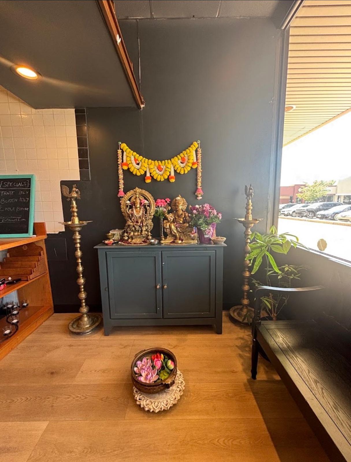 The shrine alcove inside Malgudi Cafe