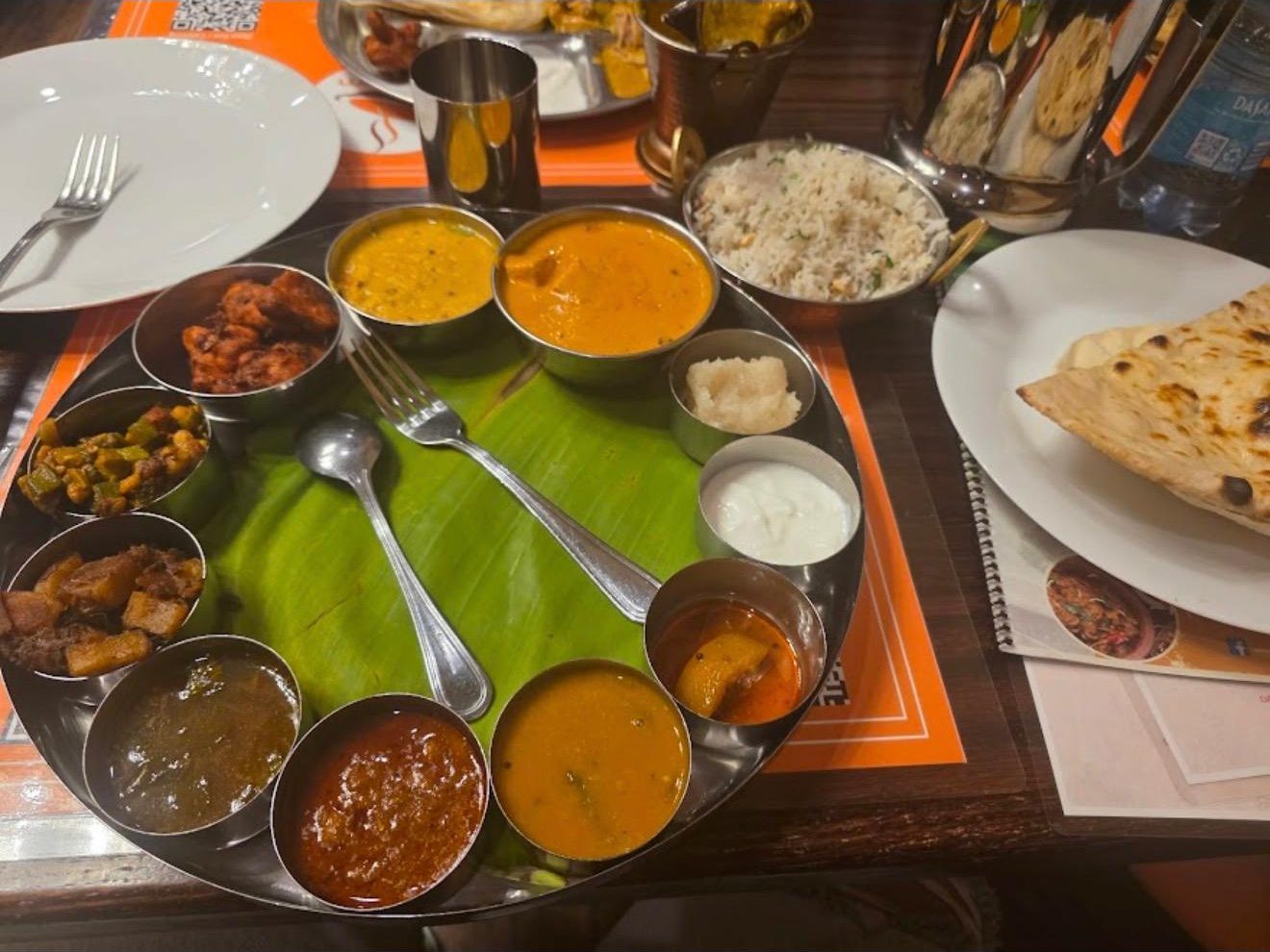 A Manam thali served on a banana leaf