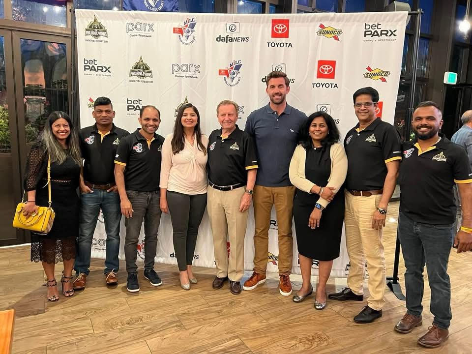 The club with sponsors at a Minor League Cricket event